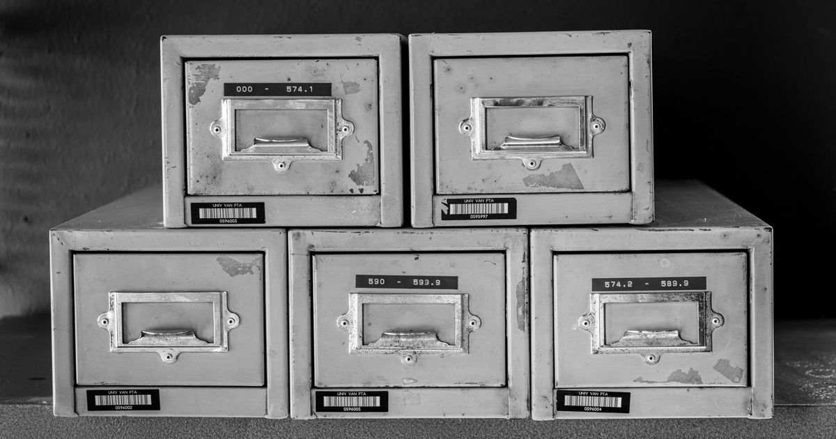 Stacked vintage metal filing cabinets