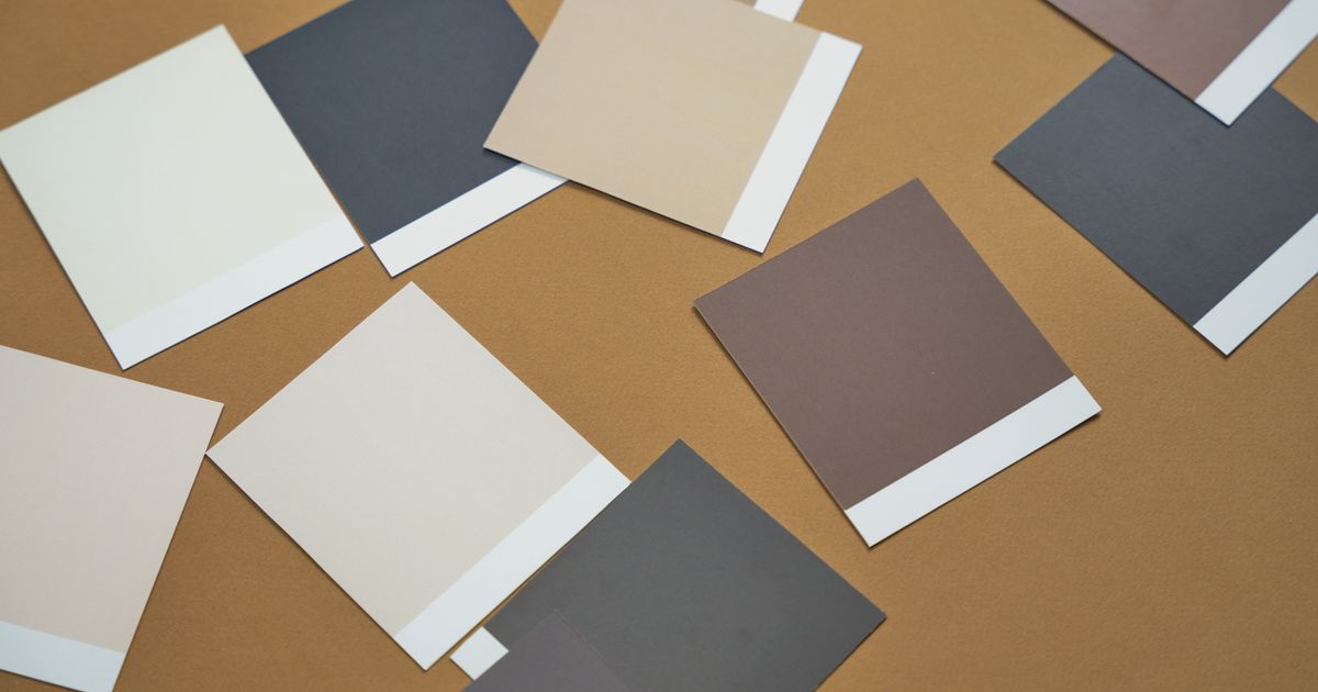 Paint colour swatches spread across a table
